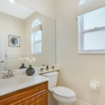 Washroom with bathtub and window